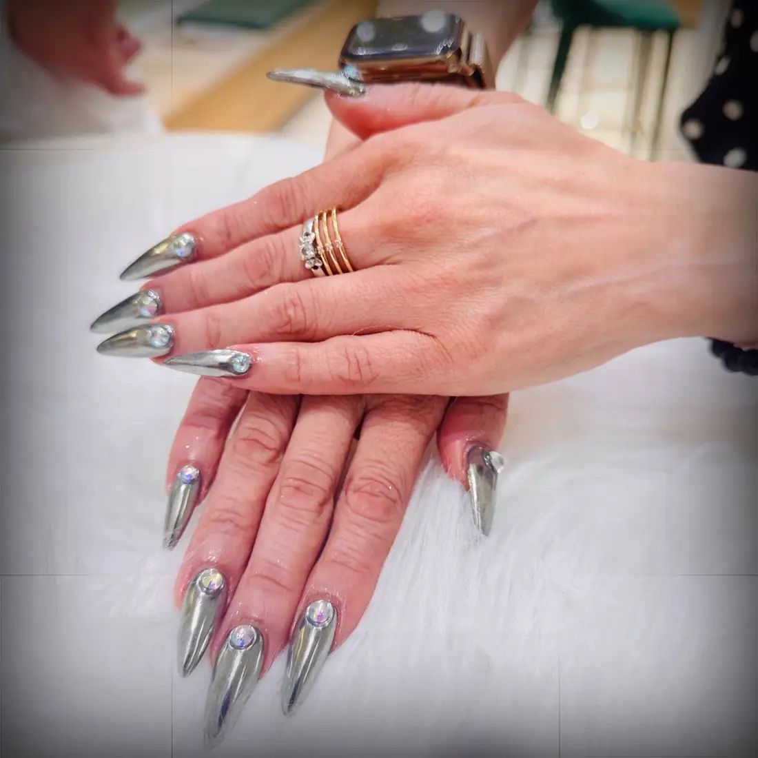 Silver chrome stiletto nails